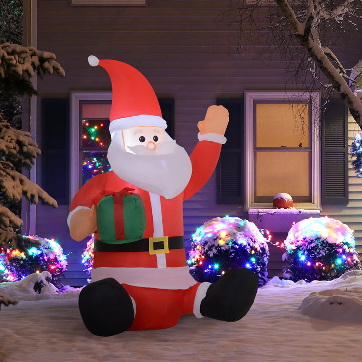 4ft Inflatable Holiday Christmas Decoration w Lights, Indoor Outdoor, Waving Santa Claus w Gift